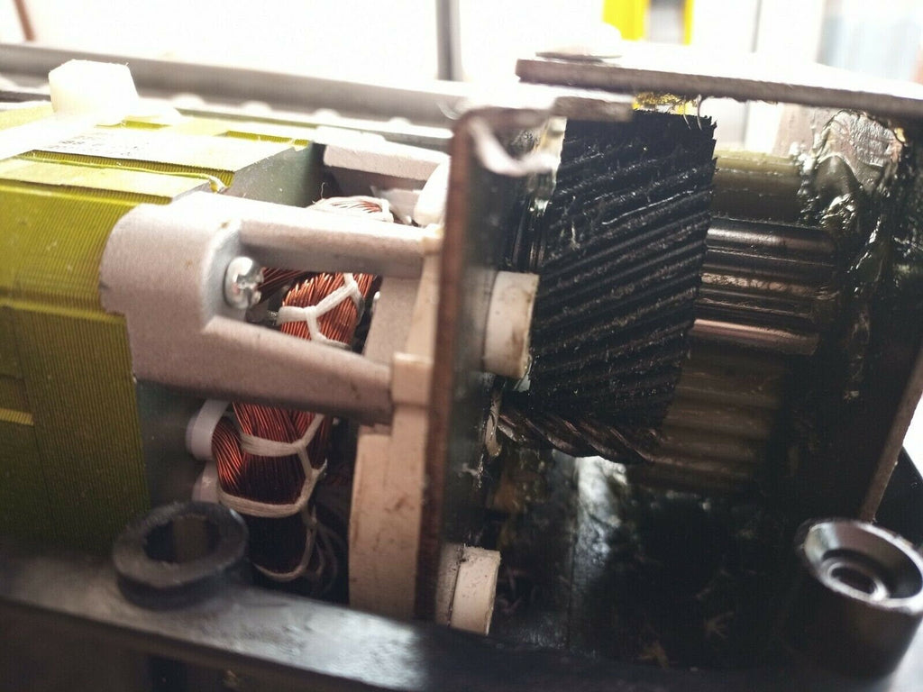 Royal 16mx shredder gear adjacent to motor with metal gear socket