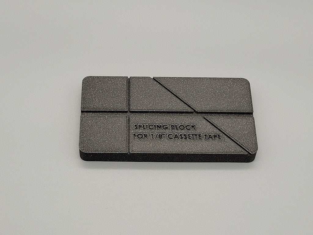 Splicing block for 1/8 inch cassette tape media